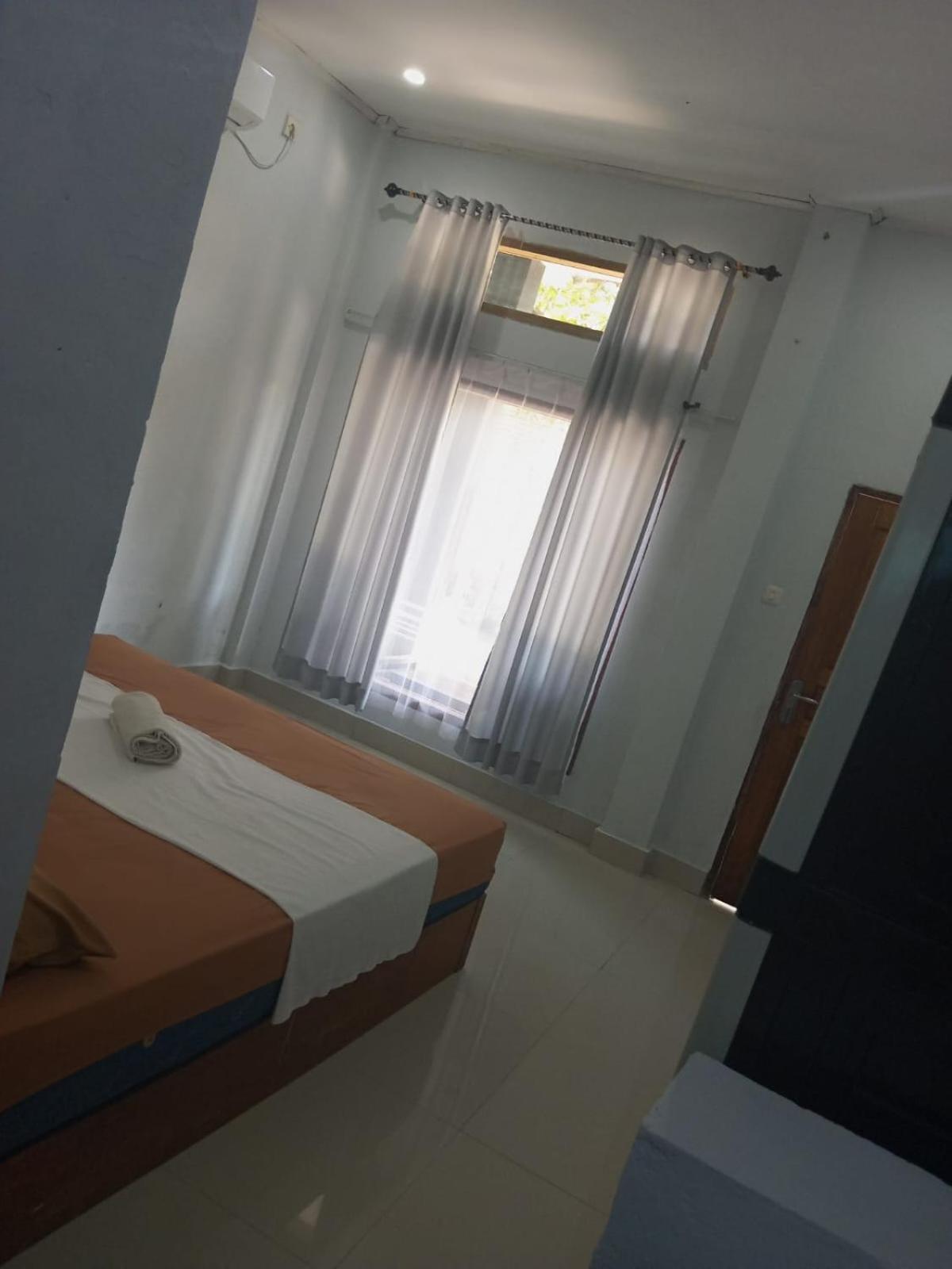Kri Homestay Kuta  Екстериор снимка