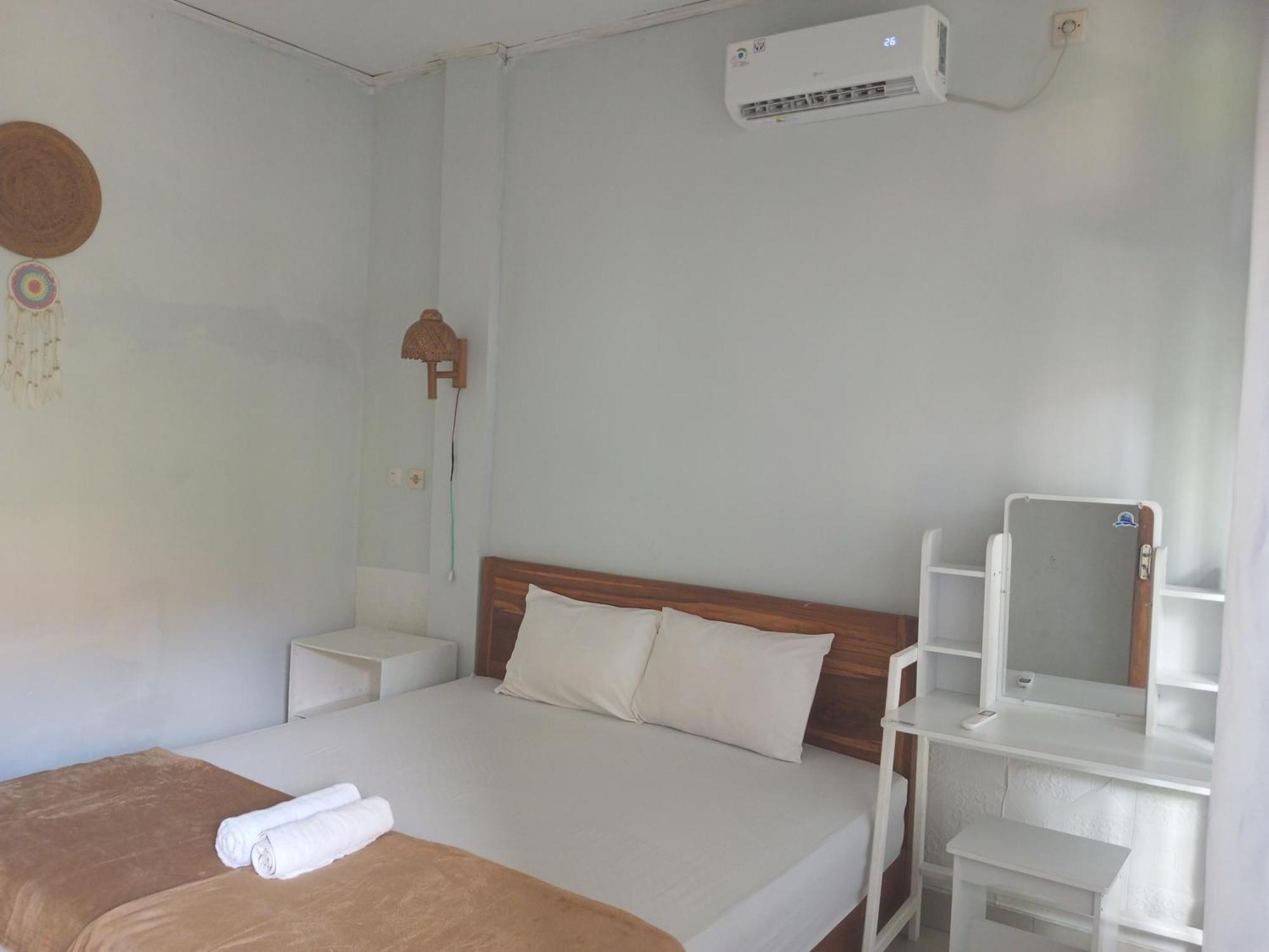 Kri Homestay Kuta  Стая снимка